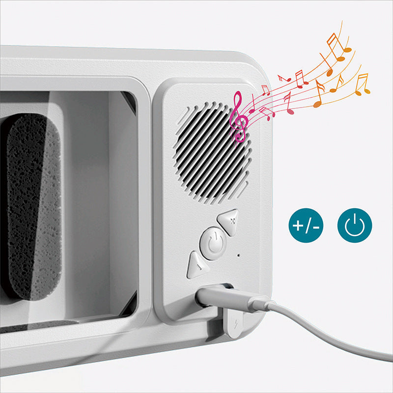 White electronic device with speaker and volume control buttons on a light gray background